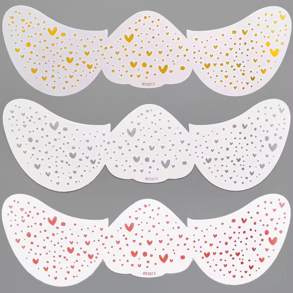 Tiny mixed accent face temporary tattoo sheet with stars hearts and dotted motifs