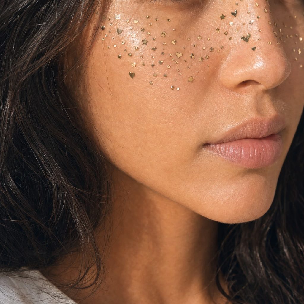 Tiny mixed accent face temporary tattoos worn on the face
