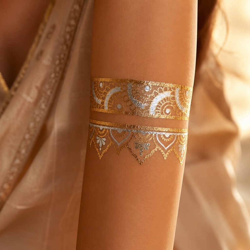 Metallic bracelet band temporary tattoo worn around the ankle