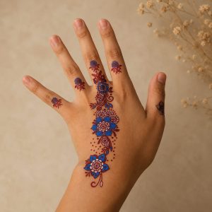 Colorful floral paisley temporary tattoo shown on the hand with neutral styling