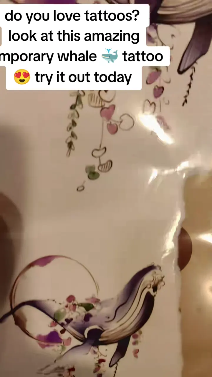 TikTok creator @onelegend_mullings showing the K526 watercolor whale temporary tattoo sheet